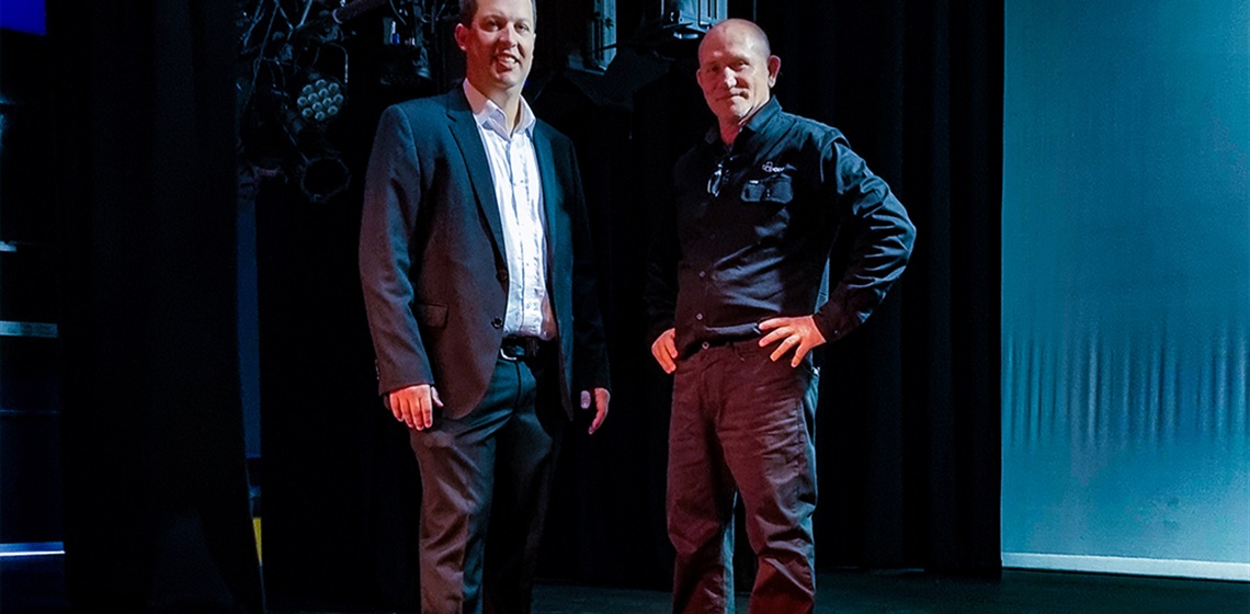 Cessnock City Mayor Cr Jay Suvaal and CPAC's Operations Team Leader John Zeder pictured on stage at CPAC